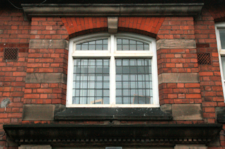 Photograph of detail above entrance to of Friars Walk Drill Hall